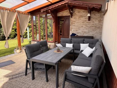 Aluminiowe meble na taras dla 8 osób z 2 sofami i stołem 180x80 - Tavaro Grande Antracite