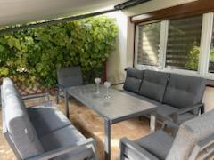 Aluminiowe meble na taras dla 8 osób z 2 sofami i stołem 180x80 - Tavaro Grande Antracite