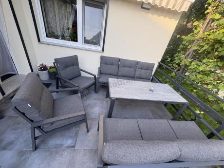 Aluminiowe meble na taras dla 8 osób z 2 sofami i stołem 180x80 - Tavaro Grande Antracite
