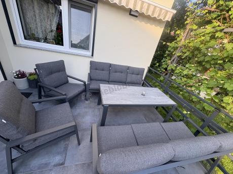 Aluminiowe meble na taras dla 8 osób z 2 sofami i stołem 180x80 - Tavaro Grande Antracite