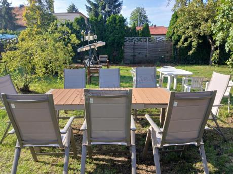 Aluminiowe meble obiadowe na taras - stół rozkładany do 210cm i 8 składanych krzeseł Tanami Daven Taupe