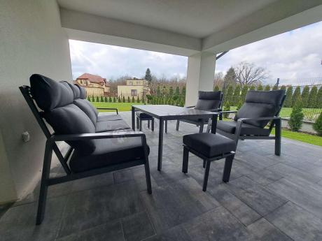 Aluminiowy zestaw ogrodowy z wysokim stołem, sofą 202cm, fotelami i pufami Renalo Dining Grafitowy