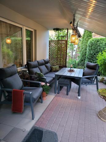 Aluminiowy zestaw ogrodowy z wysokim stołem, sofą 202cm, fotelami i pufami Renalo Dining Grafitowy