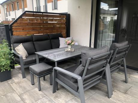 Aluminiowy zestaw ogrodowy z wysokim stołem, sofą 202cm, fotelami i pufami Renalo Dining Grafitowy