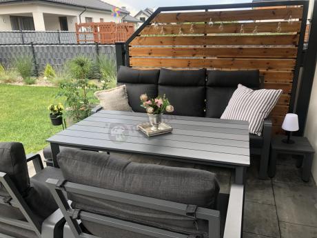 Aluminiowy zestaw ogrodowy z wysokim stołem, sofą 202cm, fotelami i pufami Renalo Dining Grafitowy