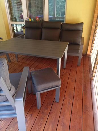 Aluminiowy zestaw ogrodowy z wysokim stołem, sofą 202cm, fotelami i pufami Renalo Dining Grafitowy