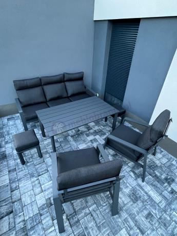 Aluminiowy zestaw ogrodowy z wysokim stołem, sofą 202cm, fotelami i pufami Renalo Dining Grafitowy