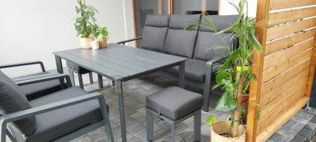 Aluminiowy zestaw ogrodowy z wysokim stołem, sofą 202cm, fotelami i pufami Renalo Family Grafitowy
