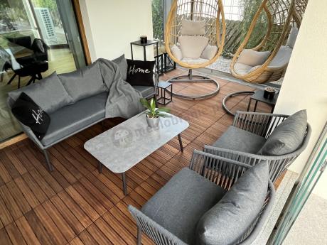 Antracytowe nowoczesne meble ogrodowe metalowe rope style z sofą, fotelami i stolikiem kawowym Kostto Cafe