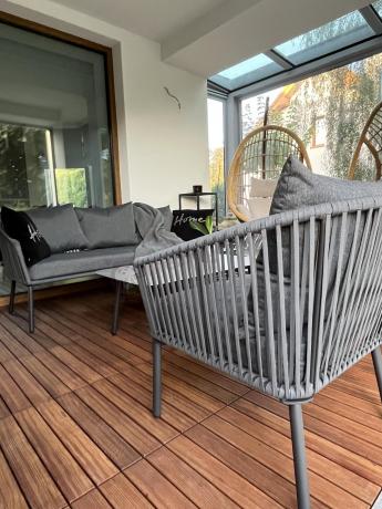 Antracytowe nowoczesne meble ogrodowe metalowe rope style z sofą, fotelami i stolikiem kawowym Kostto Cafe