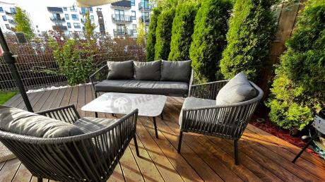 Antracytowe nowoczesne meble ogrodowe metalowe rope style z sofą, fotelami i stolikiem kawowym Kostto Cafe