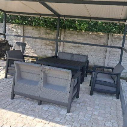 Ażurowe meble tarasowe Scali Fiesta grafit dla 6 osób ze stołem regulowanym