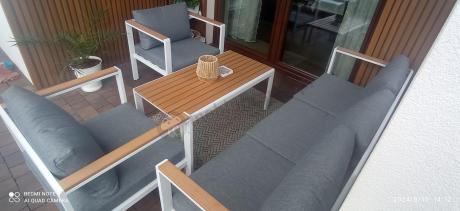 Biały komplet aluminiowych mebli ogrodowych dla 5 osób z sofą 190cm Stine