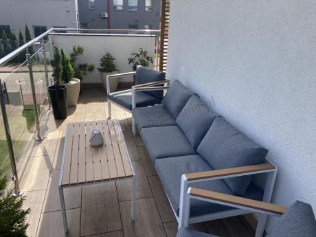 Biały komplet aluminiowych mebli ogrodowych dla 5 osób z sofą 190cm Stine
