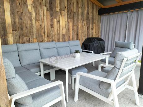 Biały zestaw mebli ogrodowych z narożnikiem, fotelami i pufami - Renalo Corner XL