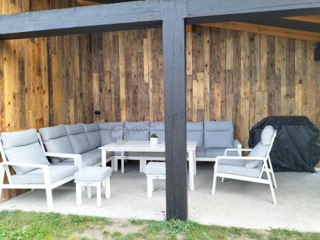 Biały zestaw mebli ogrodowych z narożnikiem, fotelami i pufami - Renalo Corner XL