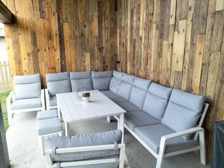 Biały zestaw mebli ogrodowych z narożnikiem, fotelami i pufami - Renalo Corner XL