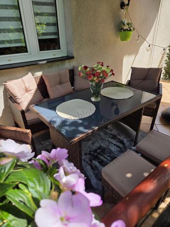 Brązowe meble technorattanowe z wysokim stołem 120cm i sofą Torino Dining
