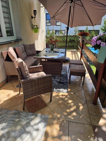 Brązowe meble technorattanowe z wysokim stołem 120cm i sofą Torino Dining