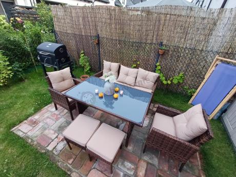 Brązowe meble technorattanowe z wysokim stołem 120cm i sofą Torino Dining