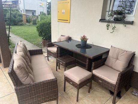 Brązowe meble technorattanowe z wysokim stołem 120cm i sofą Torino Dining