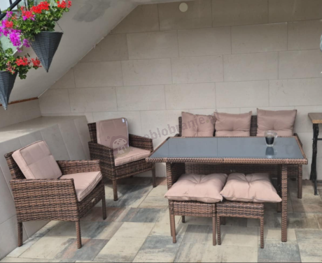 Brązowe meble technorattanowe z wysokim stołem 120cm i sofą Torino Dining