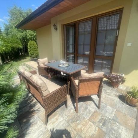 Brązowe meble technorattanowe z wysokim stołem 120cm i sofą Torino Dining