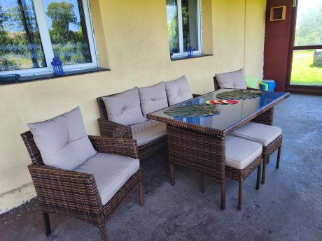 Brązowe meble technorattanowe z wysokim stołem 120cm i sofą Torino Dining