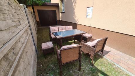 Brązowe meble technorattanowe z wysokim stołem 120cm i sofą Torino Dining