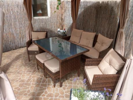Brązowe meble technorattanowe z wysokim stołem 120cm i sofą Torino Dining