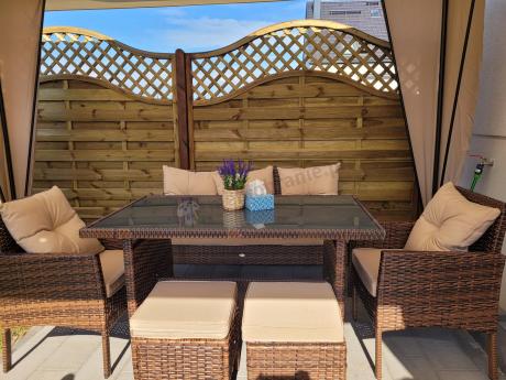 Brązowe meble technorattanowe z wysokim stołem 120cm i sofą Torino Dining