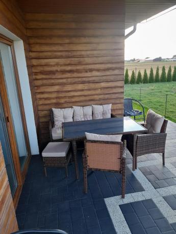 Brązowe meble technorattanowe z wysokim stołem 120cm i sofą Torino Dining