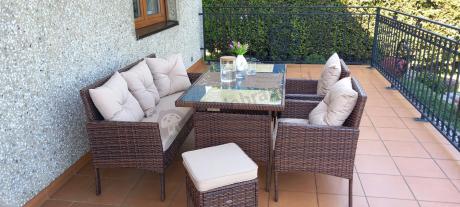 Brązowe meble technorattanowe z wysokim stołem 120cm i sofą Torino Dining