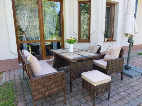 Brązowe meble technorattanowe z wysokim stołem 120cm i sofą Torino Dining