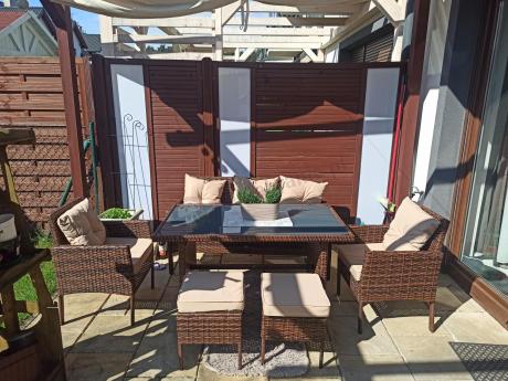 Brązowe meble technorattanowe z wysokim stołem 120cm i sofą Torino Dining