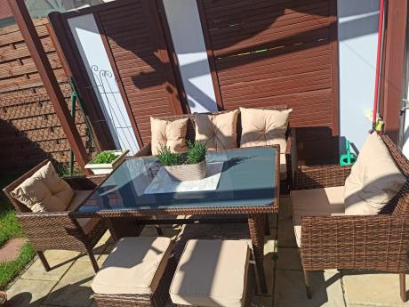 Brązowe meble technorattanowe z wysokim stołem 120cm i sofą Torino Dining