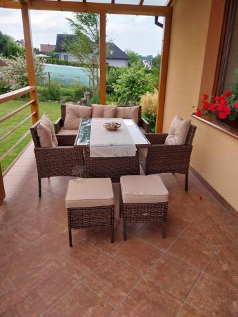 Brązowe meble technorattanowe z wysokim stołem 120cm i sofą Torino Dining