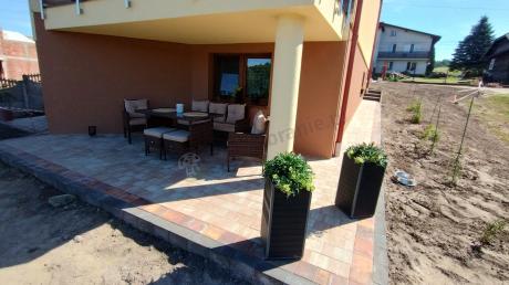 Brązowe meble technorattanowe z wysokim stołem 120cm i sofą Torino Dining