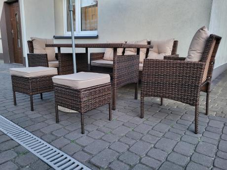 Brązowe meble technorattanowe z wysokim stołem 120cm i sofą Torino Dining
