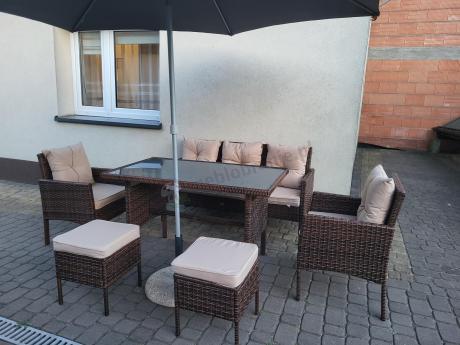 Brązowe meble technorattanowe z wysokim stołem 120cm i sofą Torino Dining