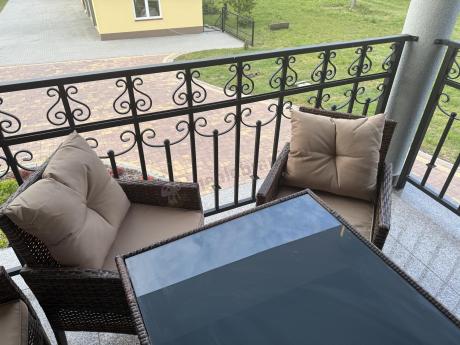 Brązowe meble technorattanowe z wysokim stołem 120cm i sofą Torino Dining