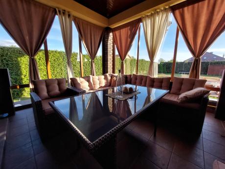 Brązowy narożnik technorattanowy z fotelem i ławką