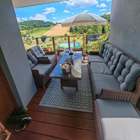 Brązowy zestaw technorattanowy tarasowy Laritto Dining + pufy - Brown