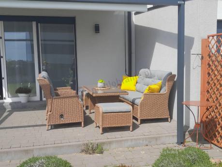 Brązowy zestaw technorattanowy tarasowy Laritto Dining + pufy - Brown