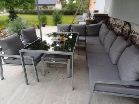Duży narożnik na taras ze stołem obiadowym fotelami i pufami Sodor Corner XXL - Silver