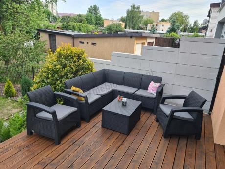 Duży narożnik na taras ze stolikiem skrzynią oraz fotelami