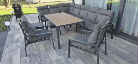 Duży narożnik ogrodowy metalowy 294x184cm Doros Corner XXL z 2 fotelami, 2 pufami i stołem 160cm - Polywood Dark Grey