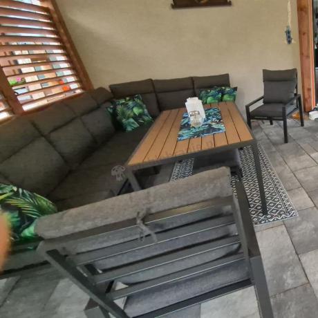 Duży narożnik ogrodowy metalowy 294x184cm Doros Corner XXL z 2 fotelami, 2 pufami i stołem 160cm - Polywood Dark Grey