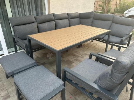 Duży narożnik ogrodowy metalowy 294x184cm Doros Corner XXL z 2 fotelami, 2 pufami i stołem 160cm - Polywood Dark Grey