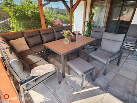 Duży narożnik ogrodowy metalowy 294x184cm Doros Corner XXL z 2 fotelami, 2 pufami i stołem 160cm - Polywood Dark Grey